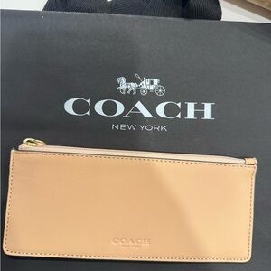 Brand New/Never Used without tags Coach Beige Leather Zip Pouch with Coach Bag
